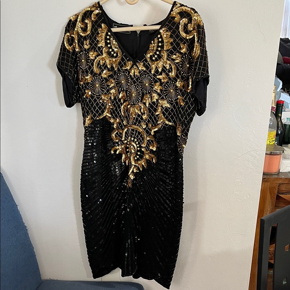 Elegant Black and Gold Sequin Mini Dress